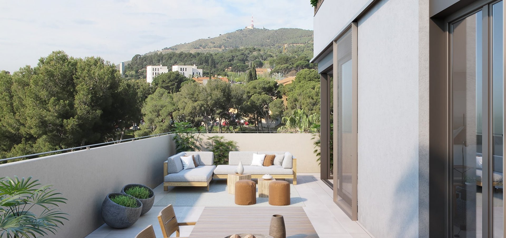 Terraza con vistas al paraje natural en el que se encuentran las viviendas de la promoción de Sarrià en Barcelona